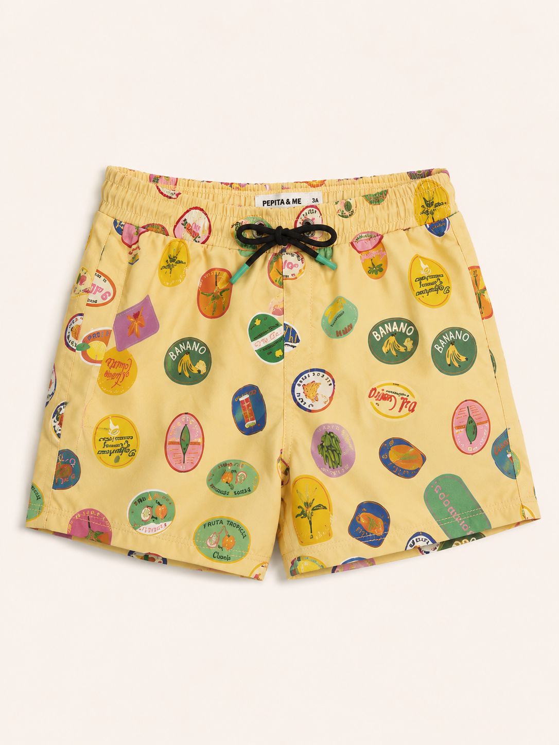 Ropa de baño amarillo con etiquetas