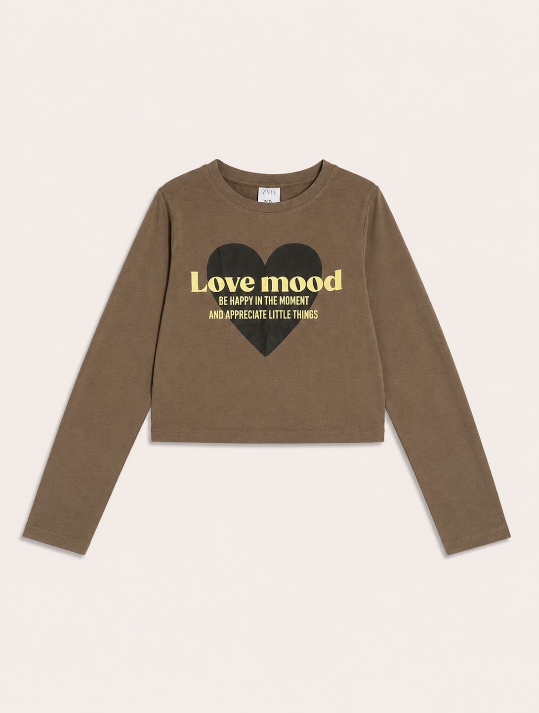 Polo beige corazón